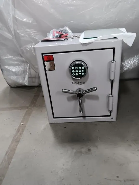Sanctuary Safe. Approx 19x17.5x17.5. With Keys,
