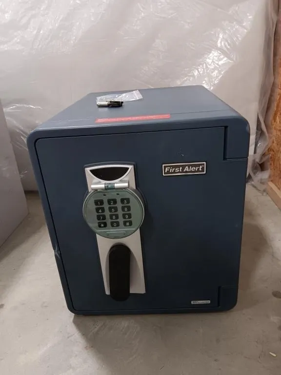 First Alert Safe With Keys. Combination Unknown.