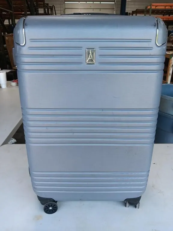 TravelPro luggage
(One zipper broken but still