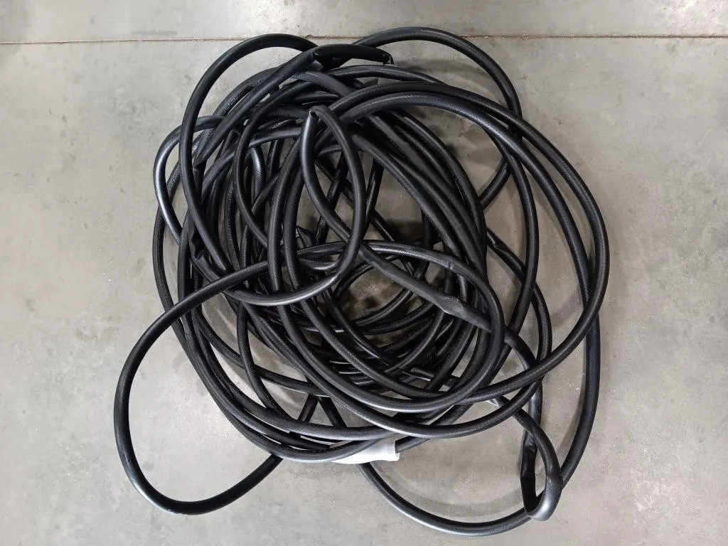 Flexon garden hose. 5/8"x100'. Used, untested