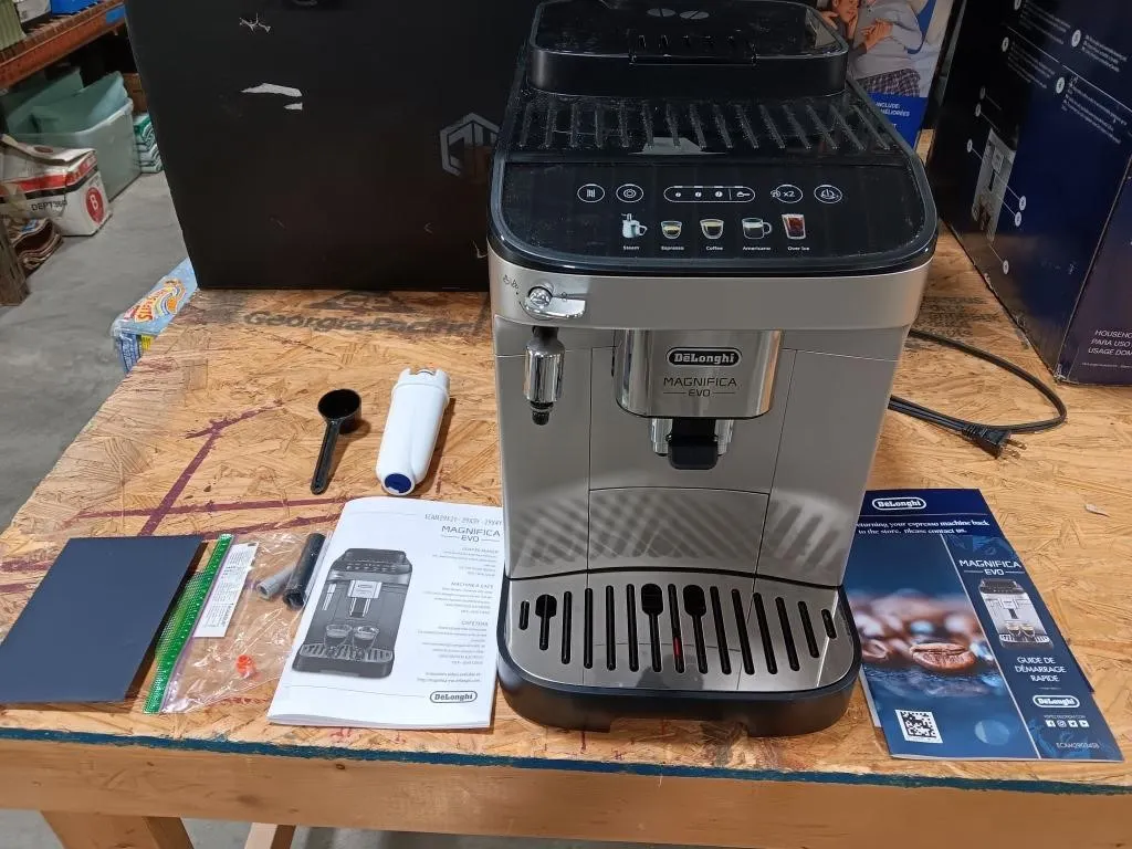 DeLonghi coffee maker. Appears to be complete