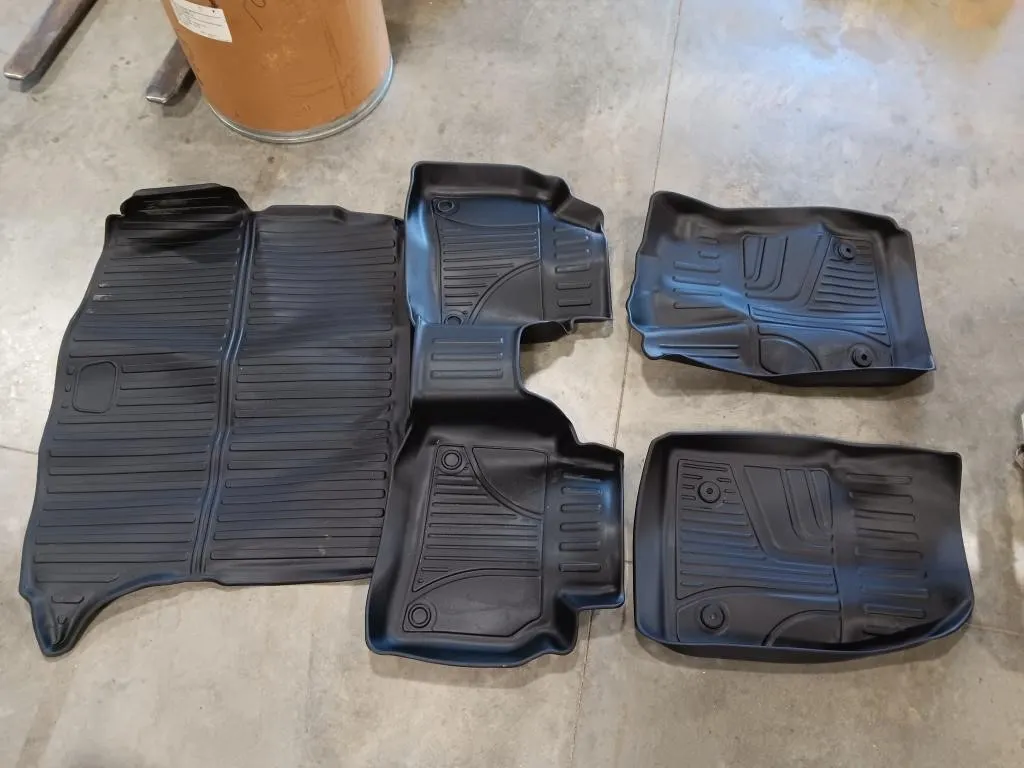 Aftermarket floor mats. Front- approximately