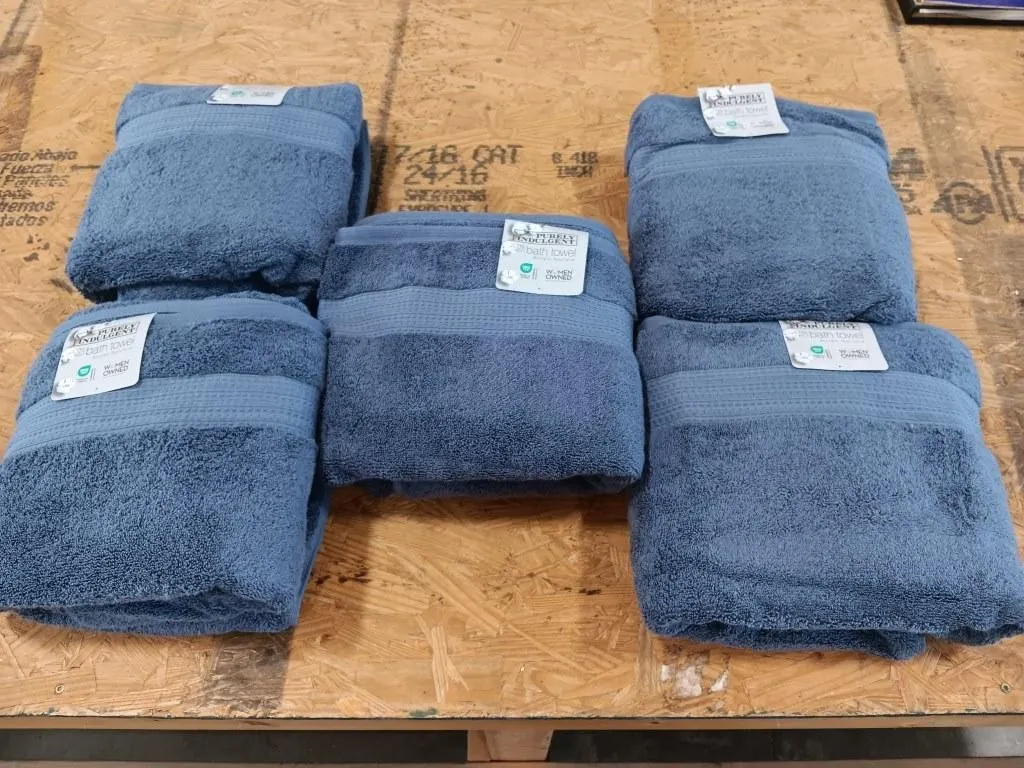 PURELY INDULGENT bath towels.
Five 100% cotton