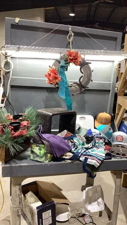 BOX W/WALL DECOR, SHELF?, SMALL TOWELS, BALL CAPS, CLOCK , LARIAT/HORSESHOE WALL HANGING , BATHROOM SCALE, XMAS CENTERPIECE