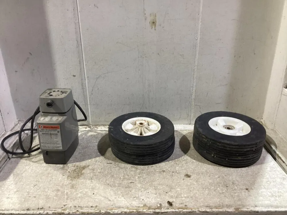 (4) DOLLY WHEELS & BLACK & DECKER DRILL BIT SHARPENERS