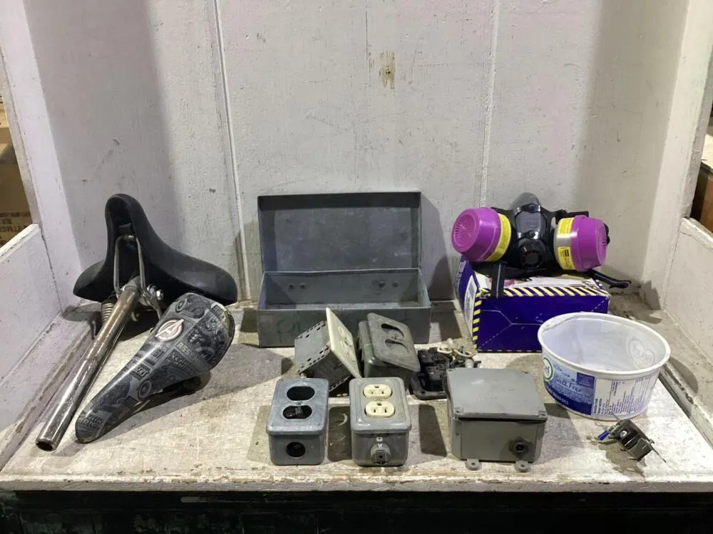 (2) SHO PAILS OF MISCELLANEOUS W/ ELETRICAL PARTS, BICYCLE SEATS, SILICONE HALF-MASK & EMPTY BOX