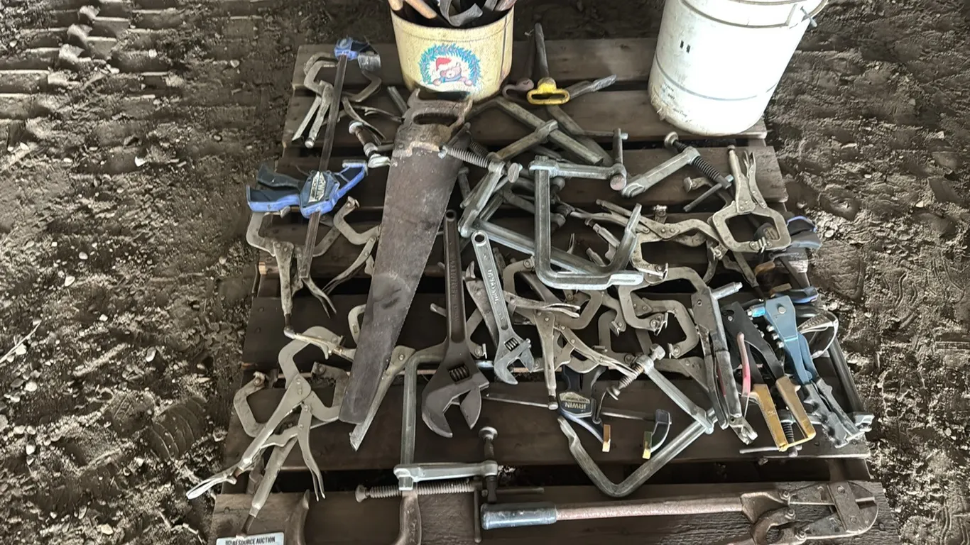 Large quantity of assorted vise grips, clamps & tools