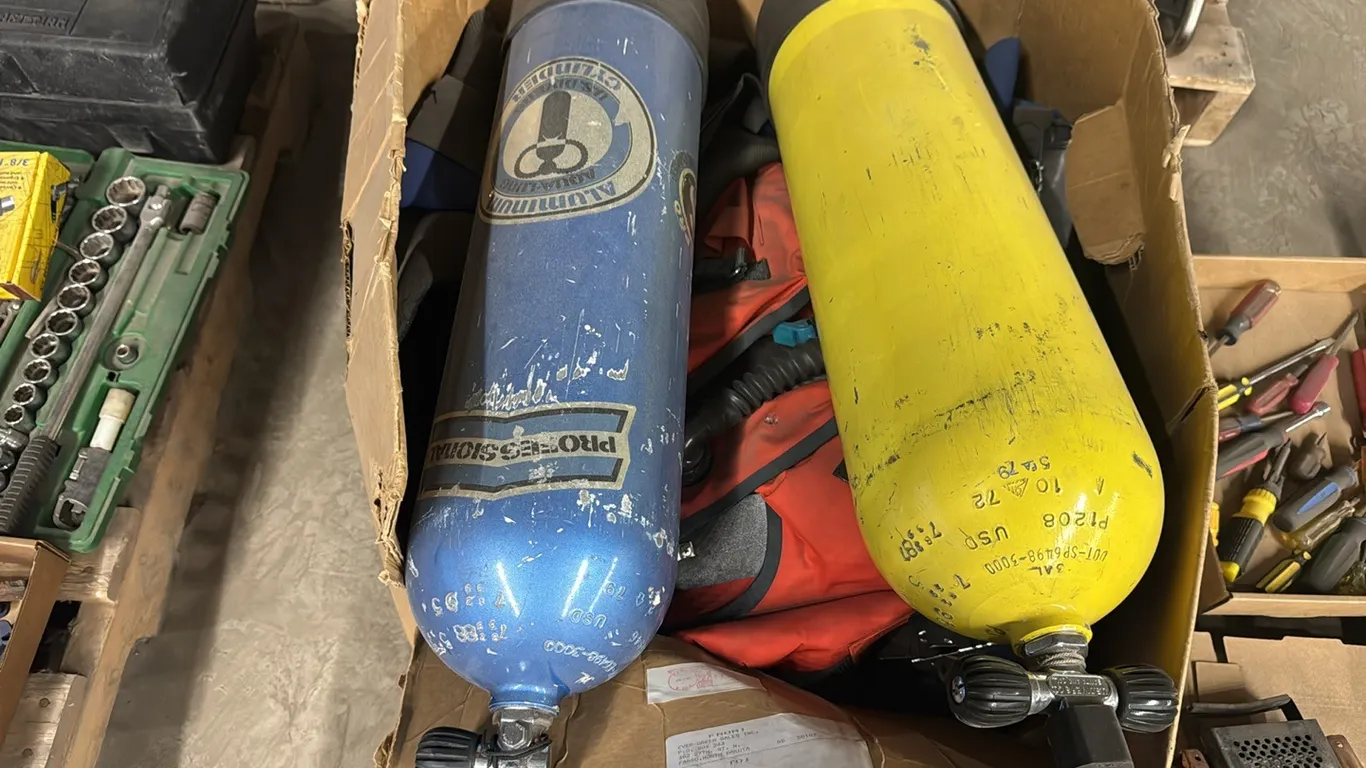 2) Scuba driving oxygen tanks w/ BCDs