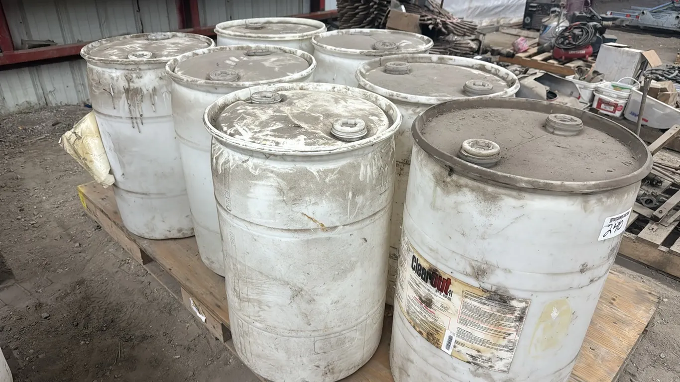 7) 30 gallon poly barrels