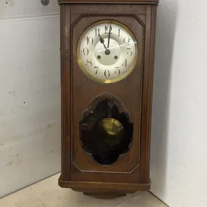 Antique Carved Wood Wall-Mounted Pendulum Chime Clock with Key, Early 20th Century, 32 × 13”