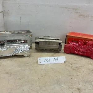 Vintage Avon Collectible Bottles Including Silver Duesenberg, Firefighter 1910, and Trolley Car