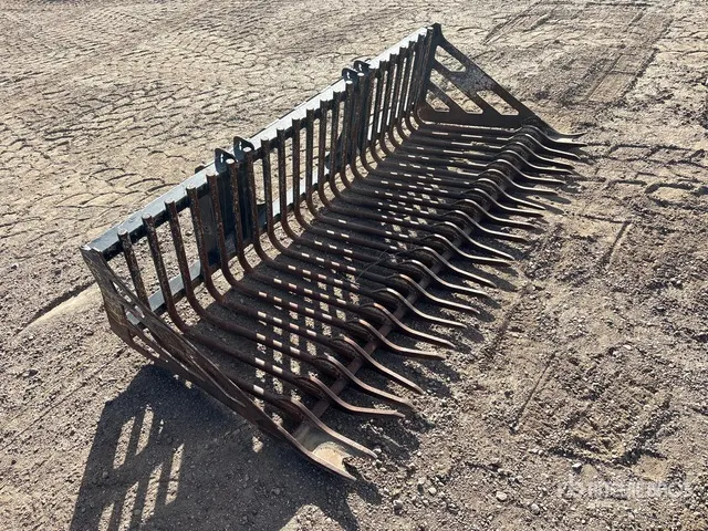 Cat 86 in Skeleton Skid Steer Bucket