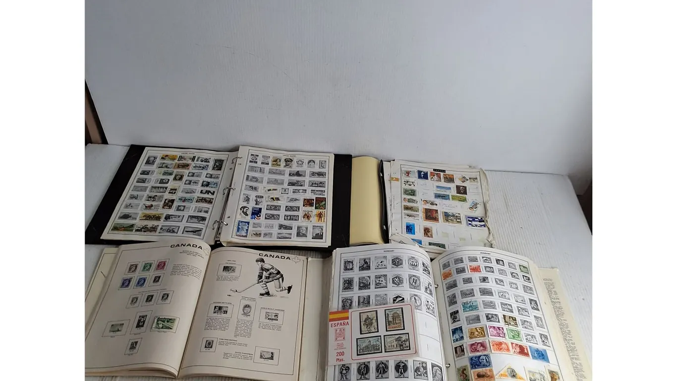 (4) Partially Filled Postage Stamp Books