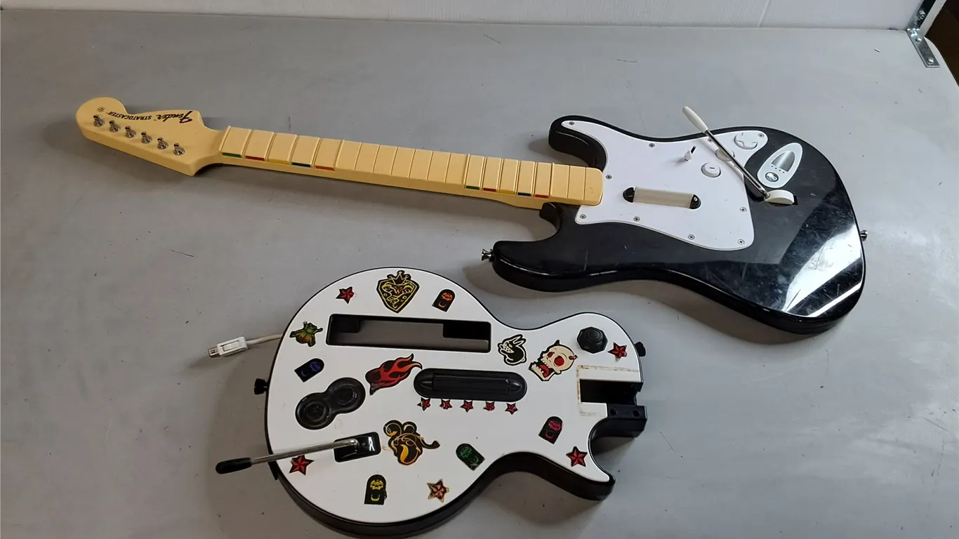(2) Rock Band & Guitar Hero Controllers- As Is
