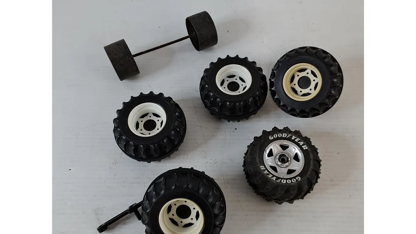 (7) Assorted Plastic Toy Tires As-Is