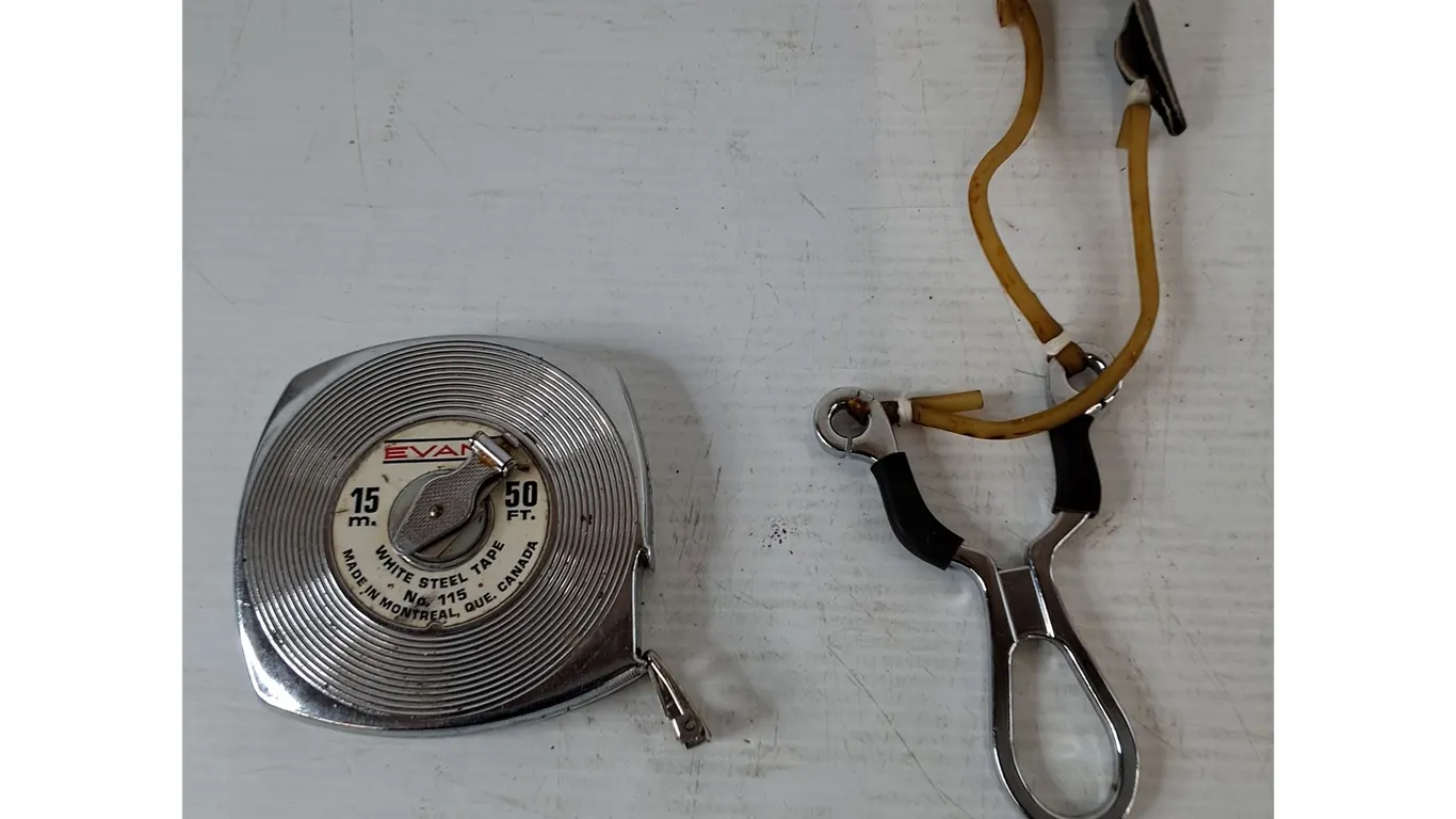 Small Slingshot and 50' Evans White Steel Tape Measure
