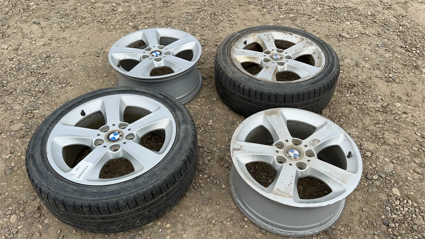 4 - Rims off 2005 BMW 325 XI - (TIRES NO GOOD)