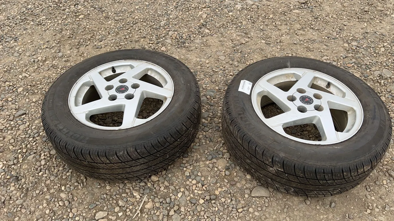 2 - P225/60R16 Pontiac Tires & Rims