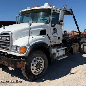 2003 Mack CV713 roll-off container truck