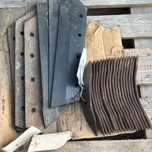 ASSORTED LOT OF CULTIVATOR POINTS AND PLOW PARTS