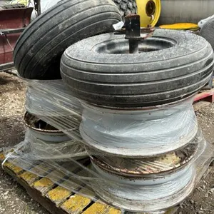 (2) GOODYEAR 9.5L-15SL TIRES ON RIMS