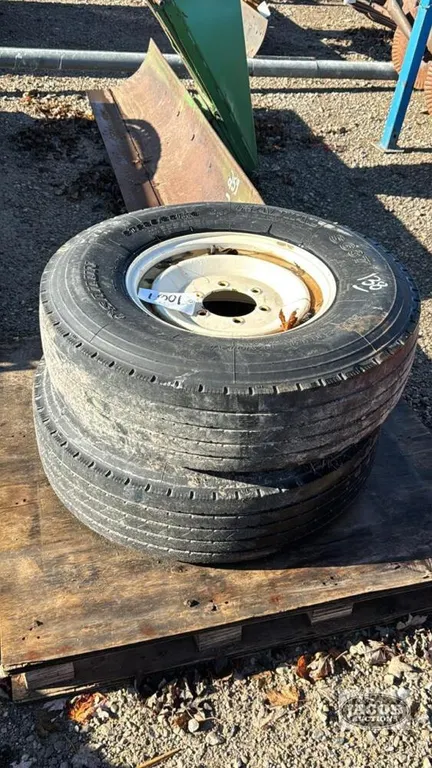 PAIR OF 235/85R16 TIRES ON 6-BOLT RIMS