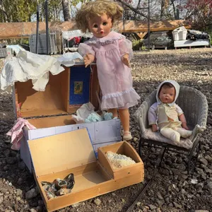 Mid-20th Century Doll Lot with Large Doll, Baby Doll, Wicker Pram, and Clothing Trunk