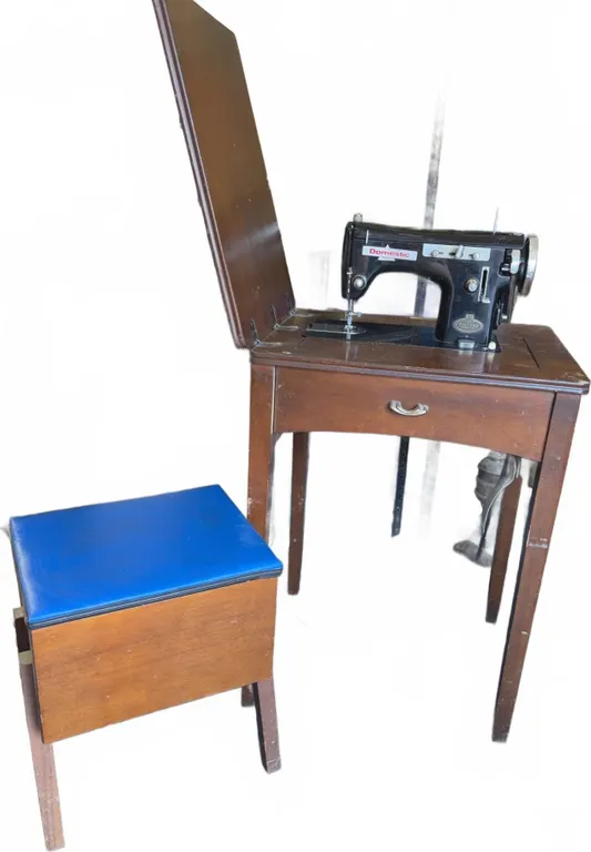 Domestic Sewing Machine with Wood Cabinet, Sewing Stool, and Notions