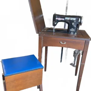 Domestic Sewing Machine with Wood Cabinet, Sewing Stool, and Notions