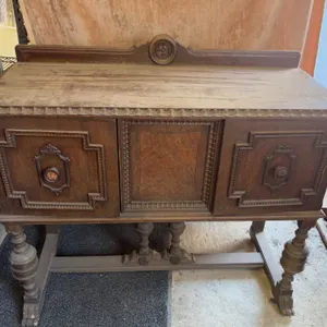 Ornate Wooden Sideboard Buffet with Decorative Carvings and Storage Compartments