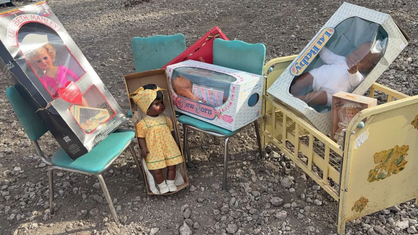 Dolls With Boxes, Metal Toy Crib and Three Blue Chrome Chairs