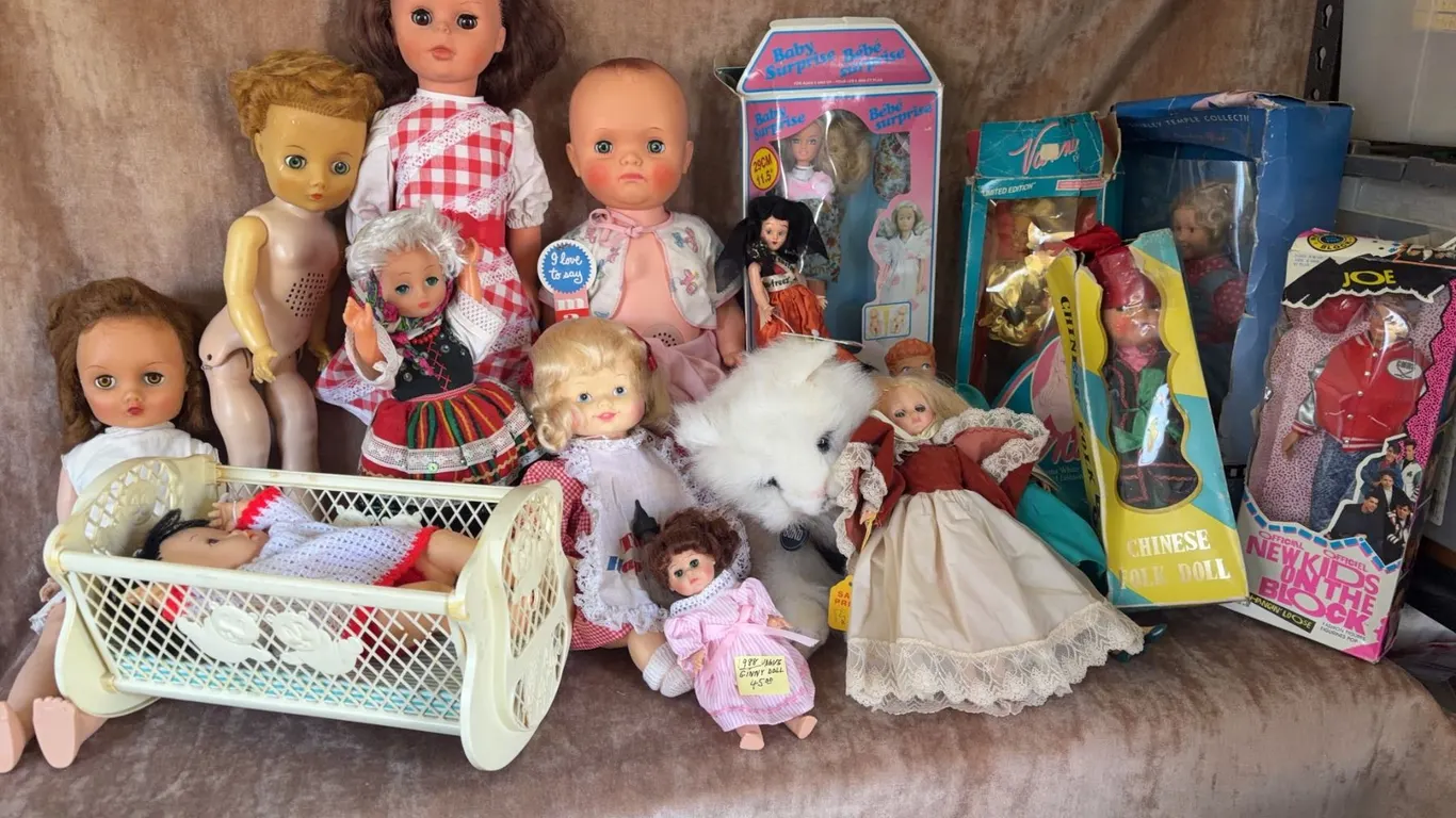 Vintage and Modern Dolls Including Baby Surprise, Barbie, and NKOTB