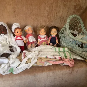 6 Dolls Including African American Baby Dolls, Wicker Basket, and Handmade Linens