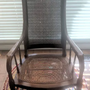 Wooden Rocking Chair with Caned Back and Seat