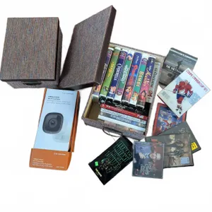 Mixed Media Collection - VHS Tapes, DVDs, Smart Camera, Storage Baskets Lot