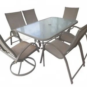 Outdoor Patio Set With Glass Table And Six Mesh Chairs