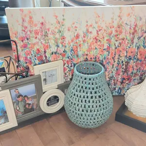 Decor Lot: Woven Vase, Art Print, Frames, Metal Magazine Rack, Candles, Books