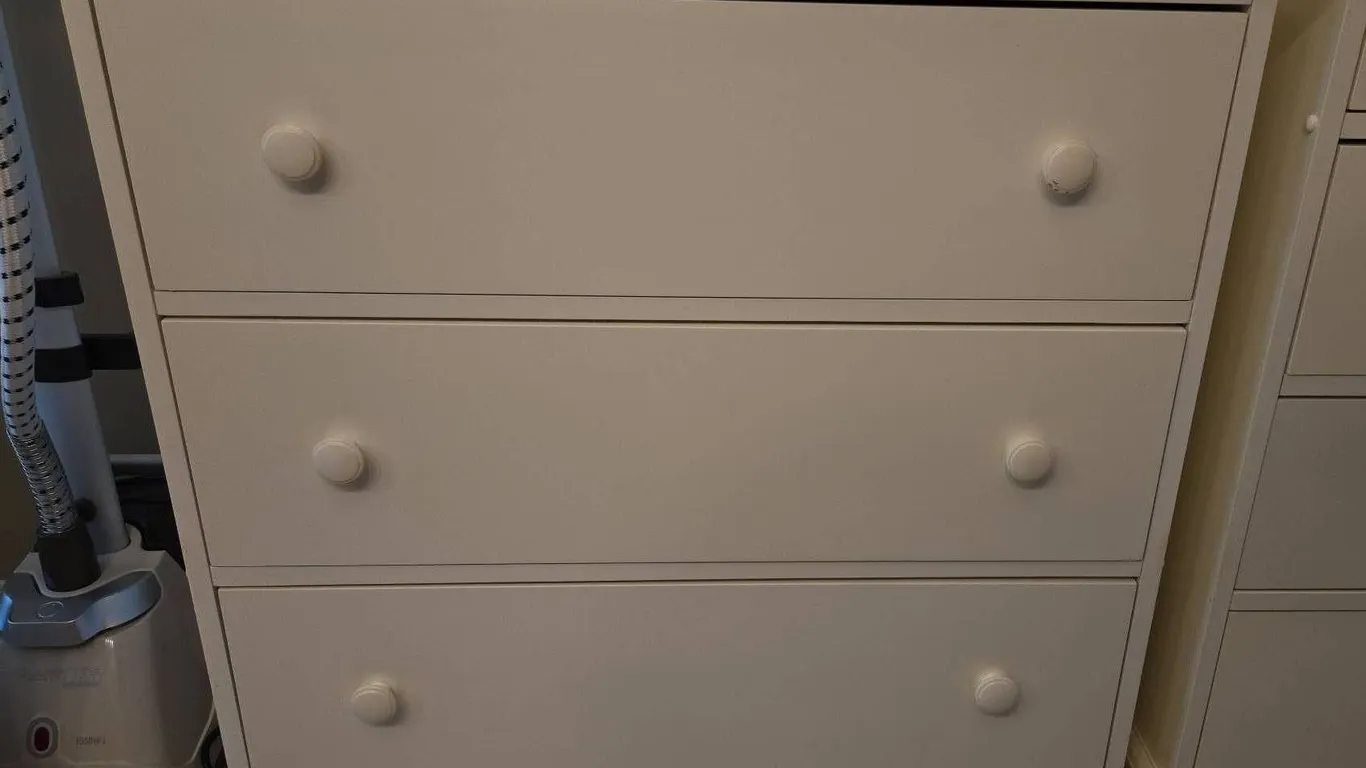 White 3-Drawer Dresser with Round Pulls and Decorative Base Trim
