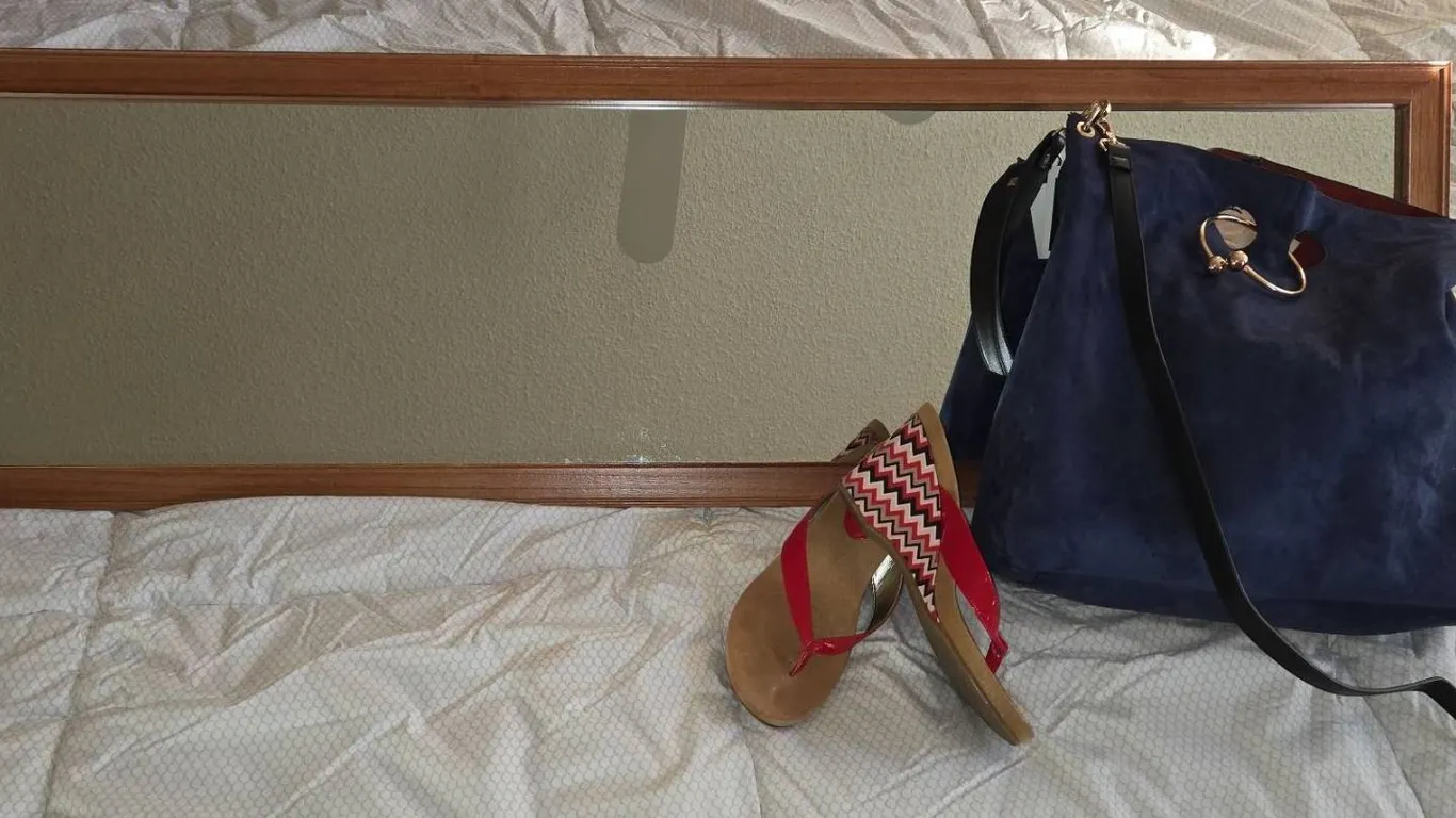 Blue Suede Purse, Red Zigzag Wedge Sandals, and Wood-Framed Wall Mirror Trio