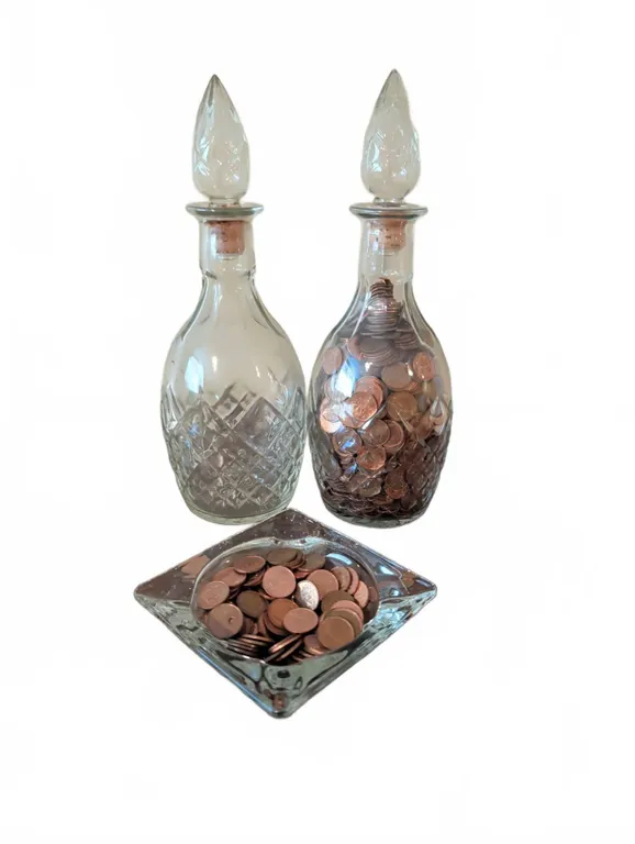 Two Cut Glass Decanters and Glass Dish with Assorted Canadian Pennies