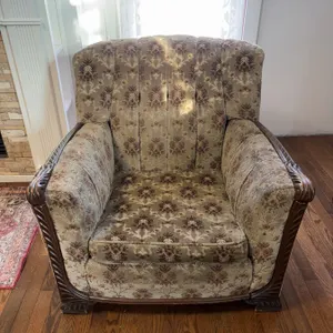 Upholstered Armchair With Carved Wood Detail