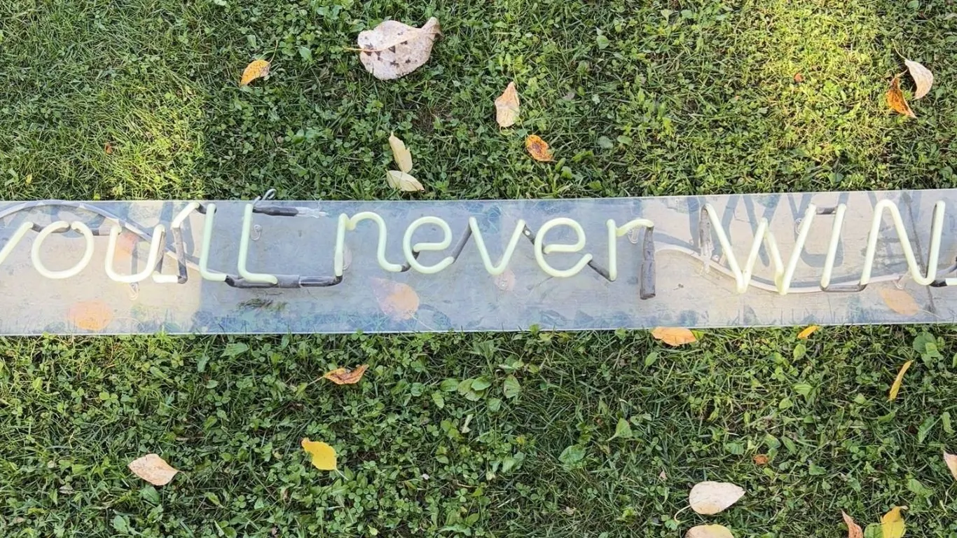 Neon Sign "You'll Never Win"