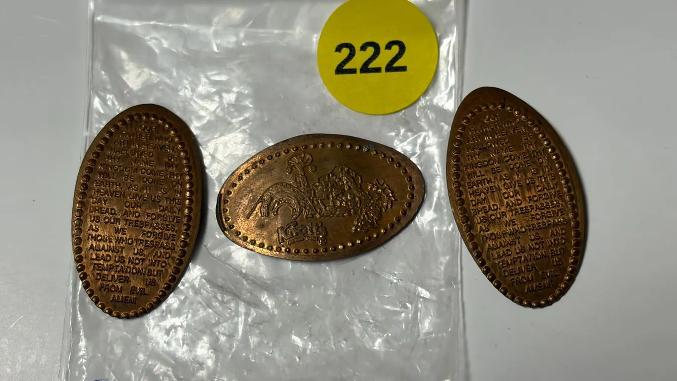 Set of three collectible elongated (pressed or smashed) pennies, which include two religious coins f