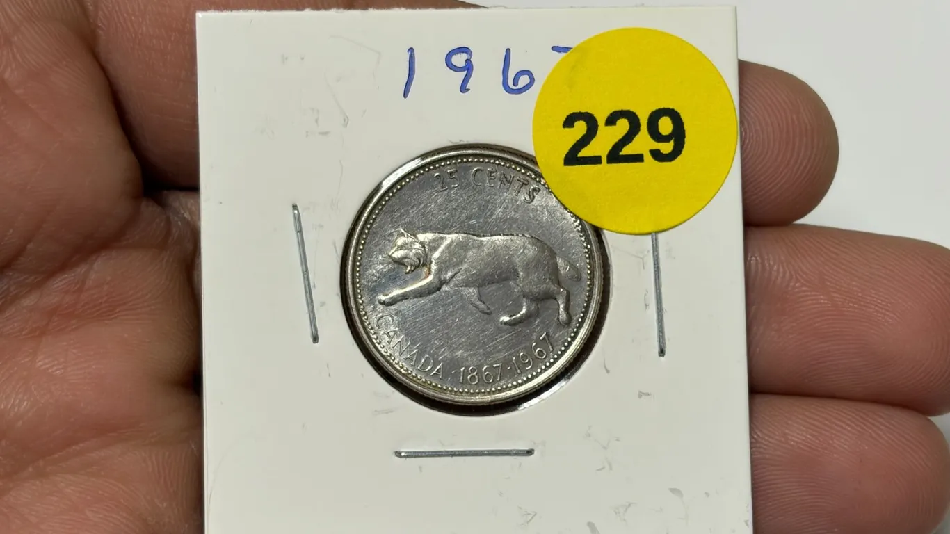 1967 Canada Silver 25 Cents.