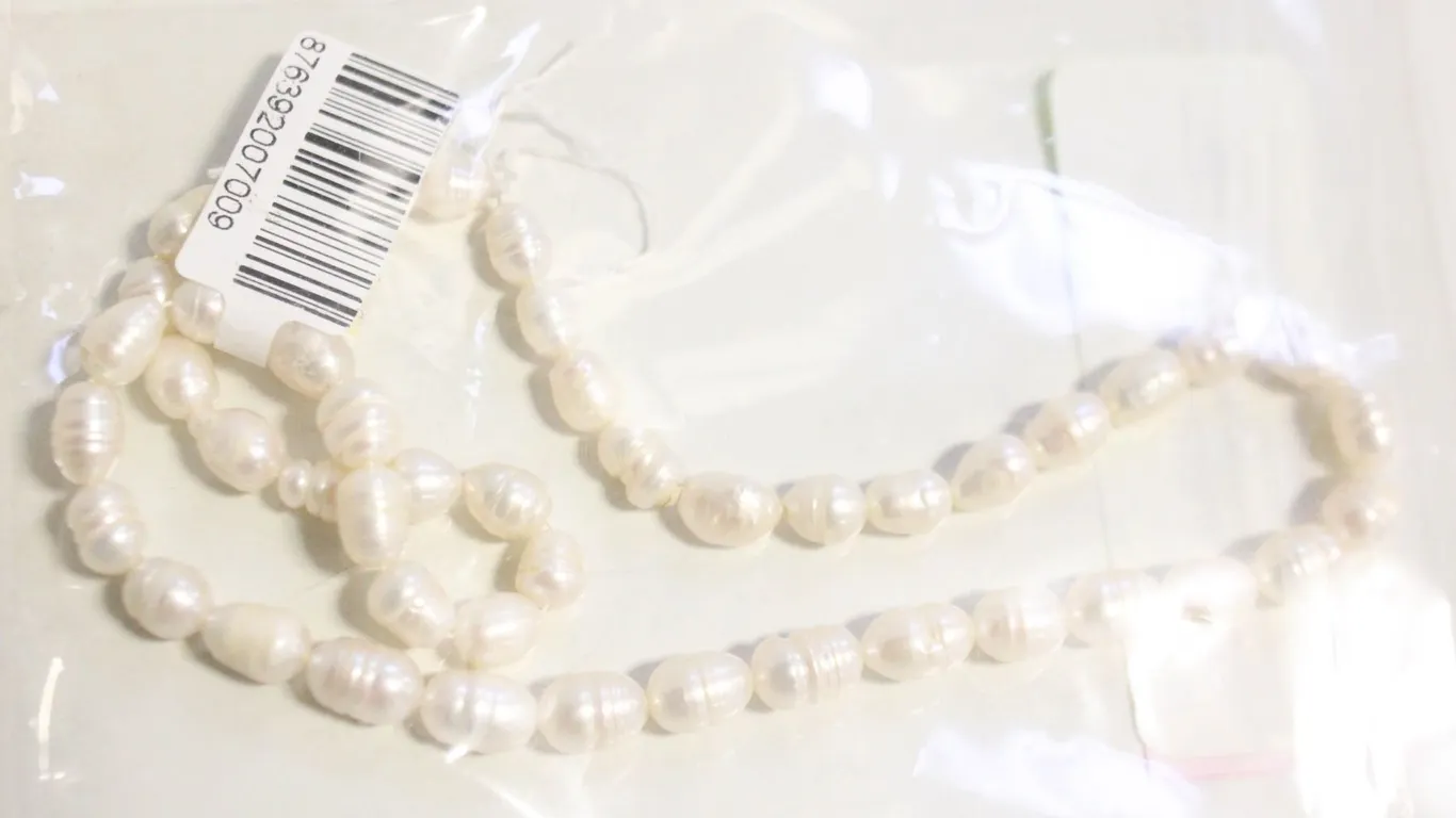 STRING OF NATURAL FRESH WATER PEARLS