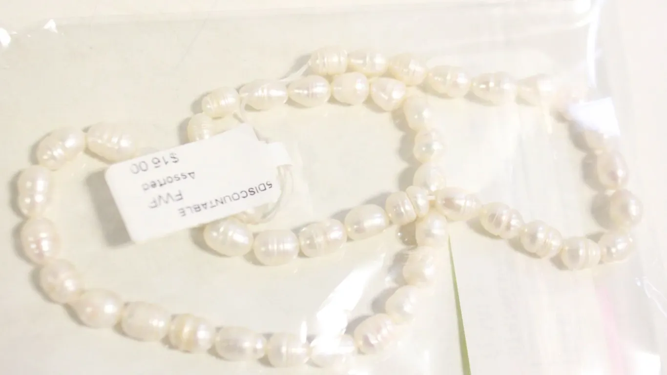 STRING OF NATURAL FRESH WATER PEARLS