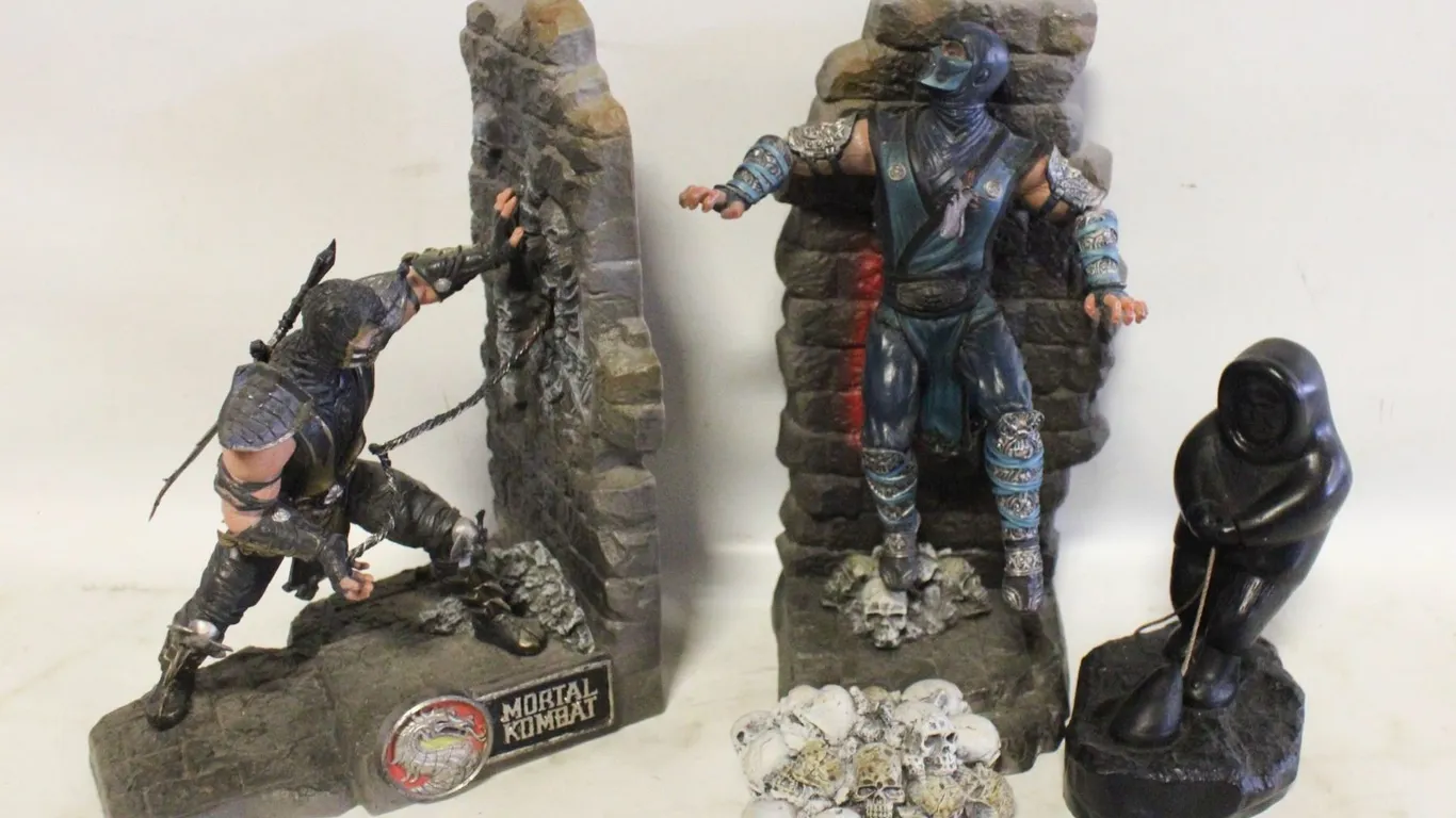 MORTAL COMBAT BOOK ENDS WITH CARVED FIGURE