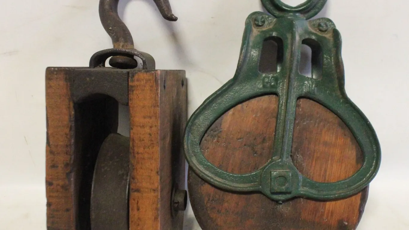 PAIR OF ESTATE OLD PULLYS