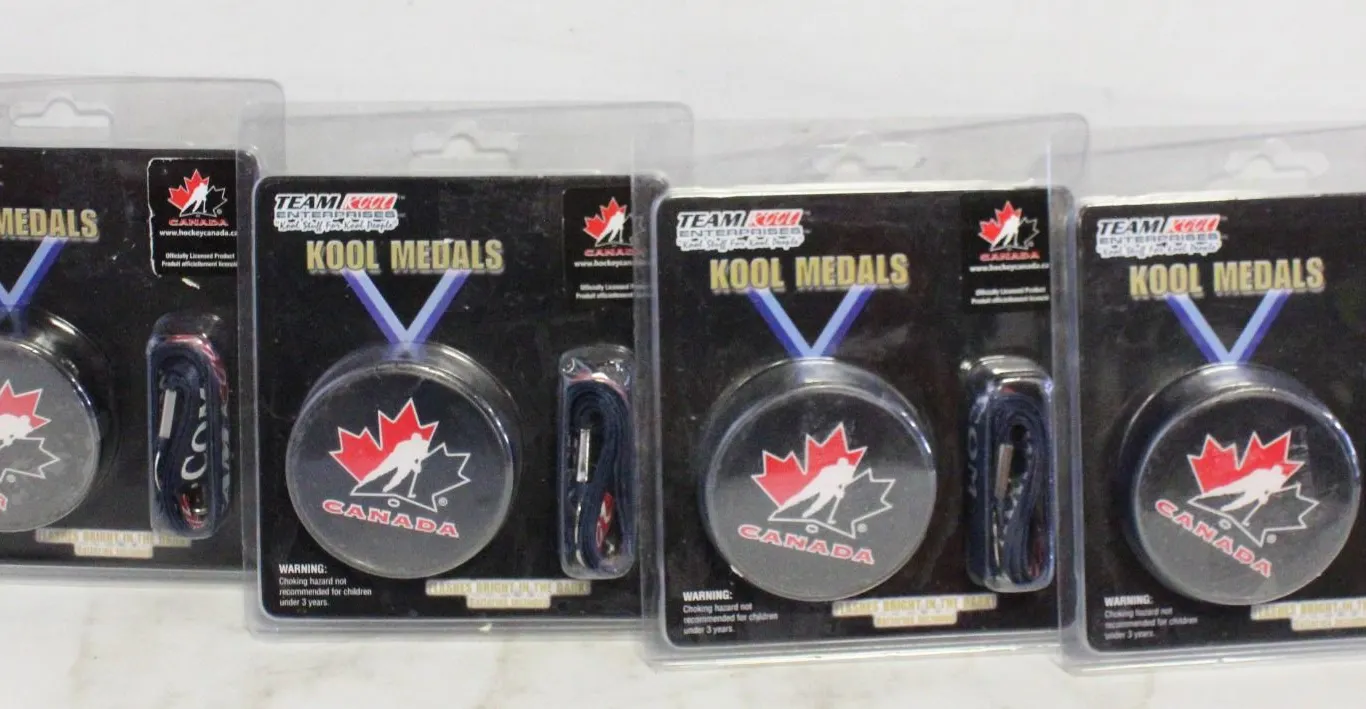 SEALED (X4) TEAM KOOL MEDALS
