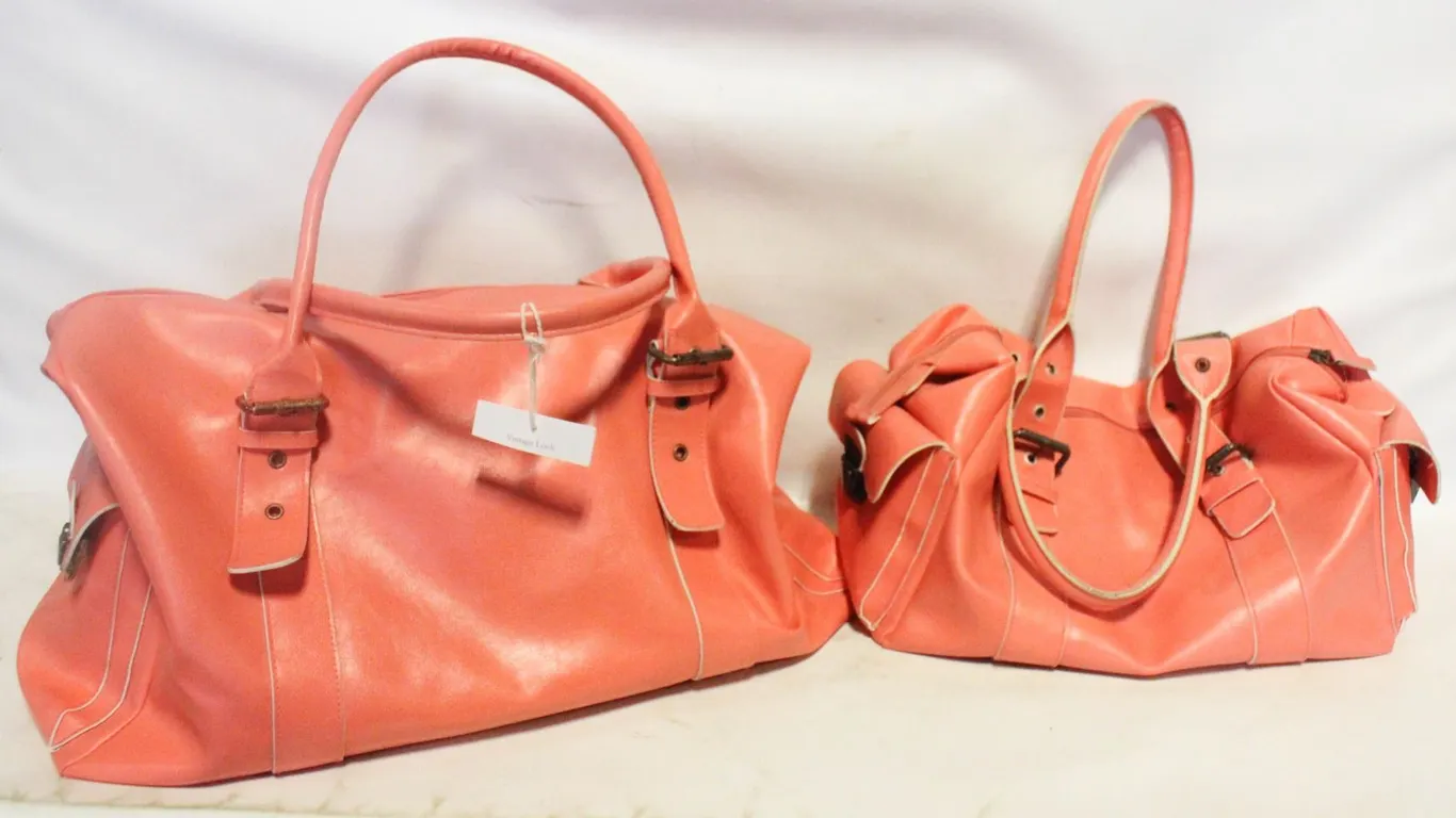 NEW RETRO STYLE BAGS. ONE 19 IN LENGTH BY 10 INCH